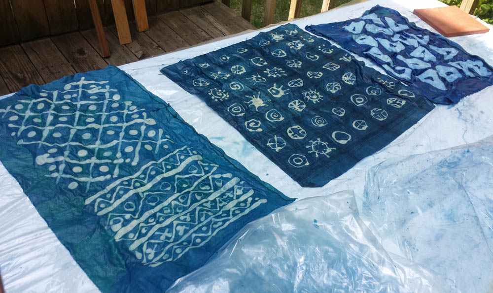 experiment with wax resist batik and indigo dye